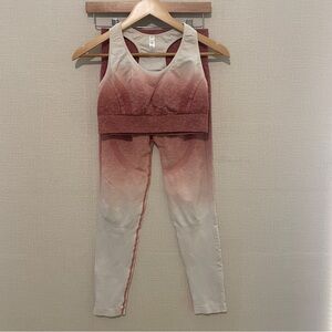 Pink ombré sports bra and leggings set. Size: medium